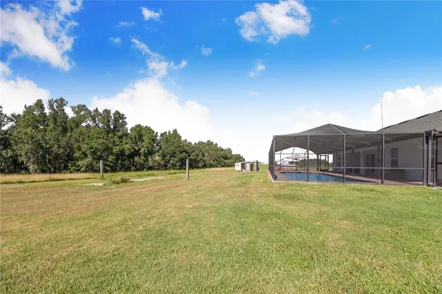 a view of outdoor space and yard