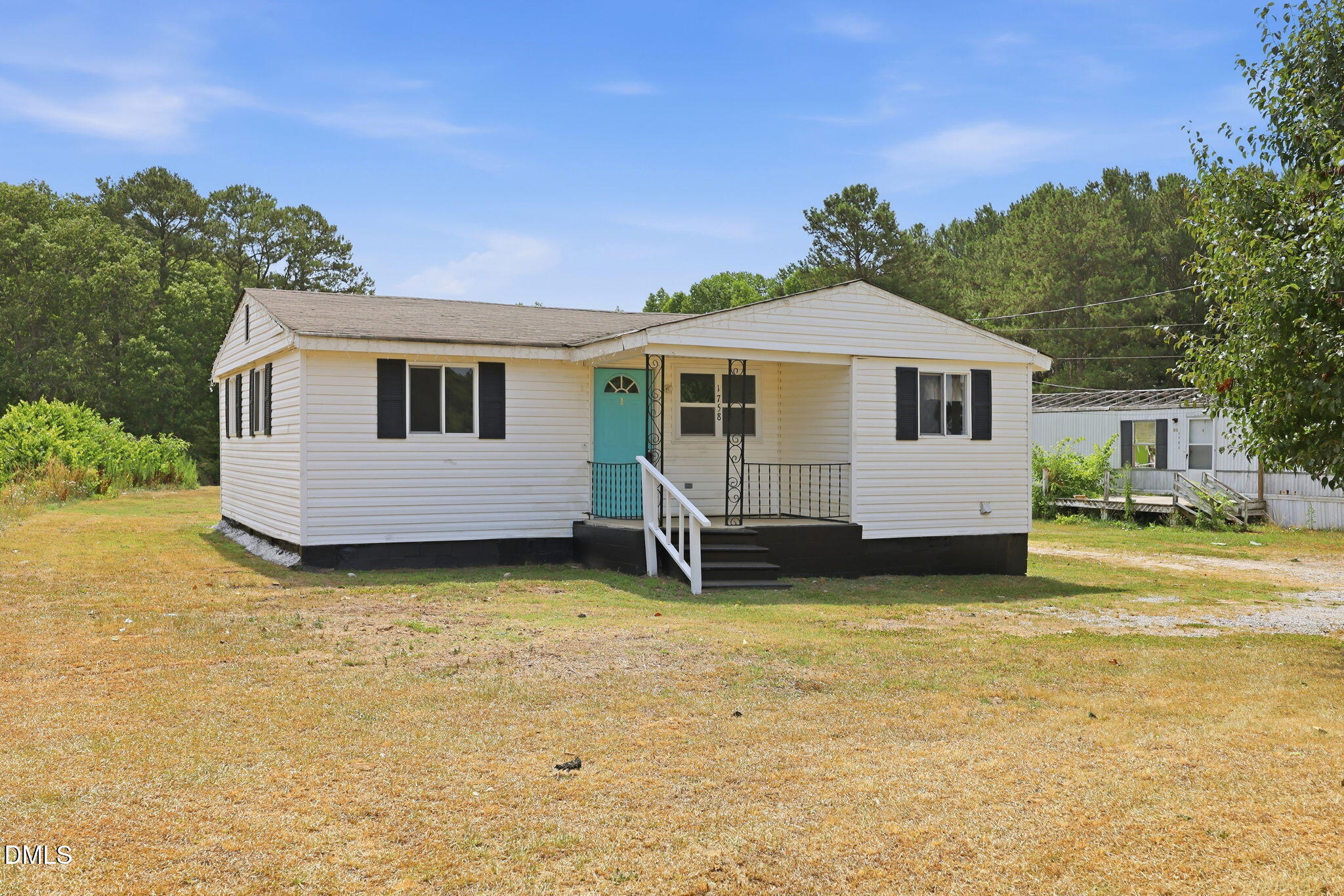 1758 Barber Mill Road Clayton, NC 27520 - Photo 2 of 41 a view of a house with a yard