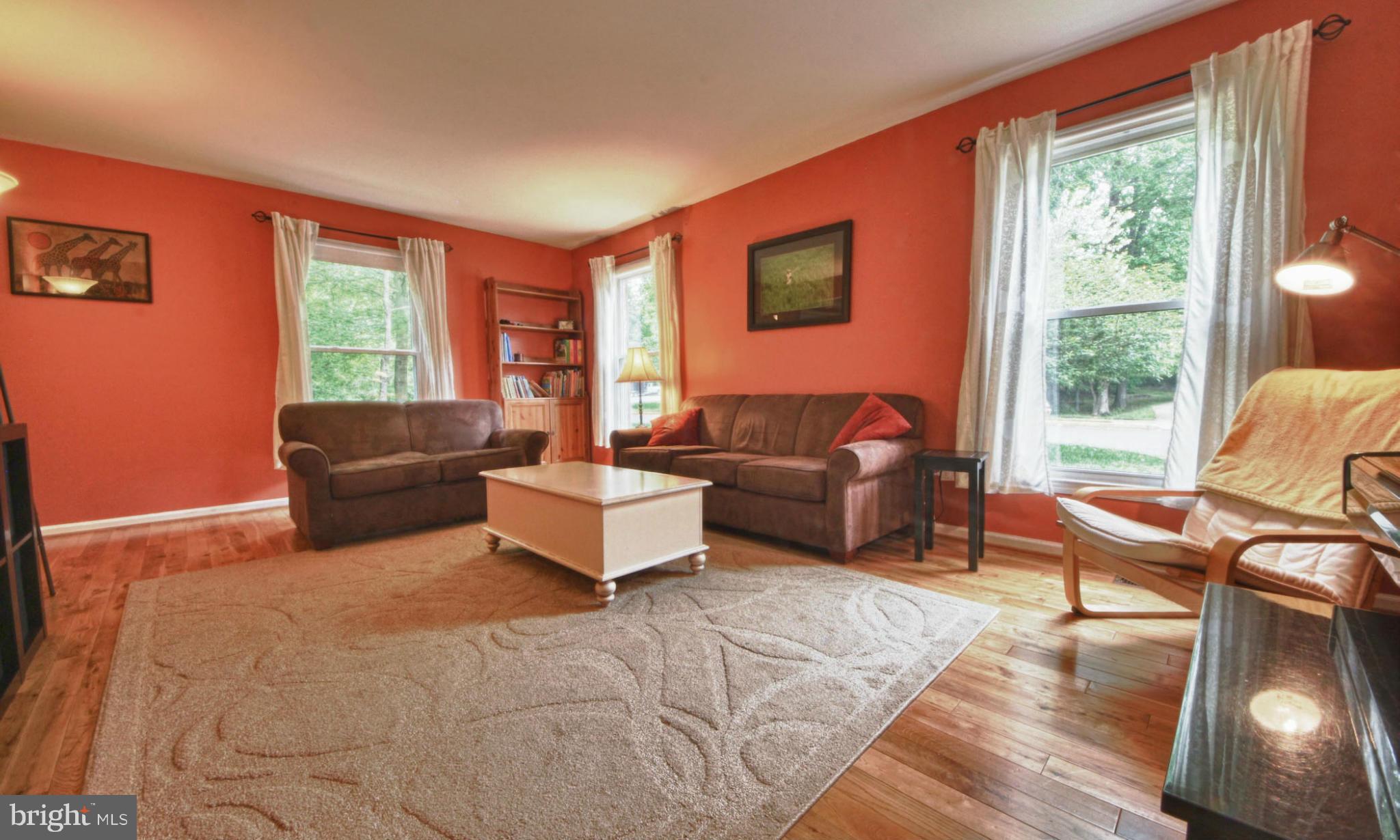 6285 Rathlin Drive Springfield, VA 22152 - Photo 3 of 18 a living room with furniture and a large window