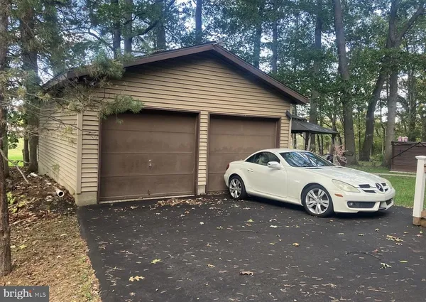 a car parked in front of a house