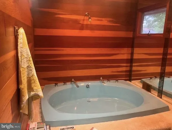 a bathroom with a tub