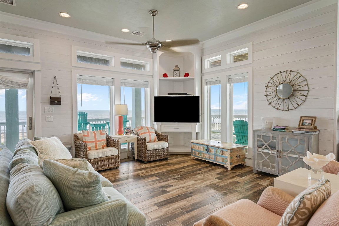 3116 James Street Crystal Beach, TX 77650 - Photo 12 of 47 a living room with furniture kitchen view and a large window