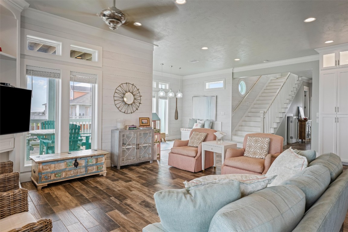 3116 James Street Crystal Beach, TX 77650 - Photo 13 of 47 a living room with furniture and a flat screen tv