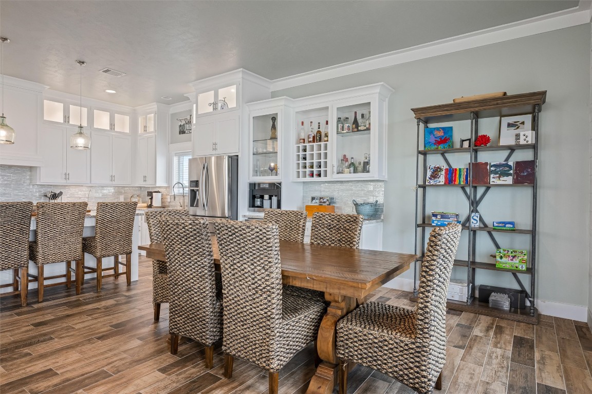 3116 James Street Crystal Beach, TX 77650 - Photo 20 of 47 a living room with furniture kitchen view and a dining table