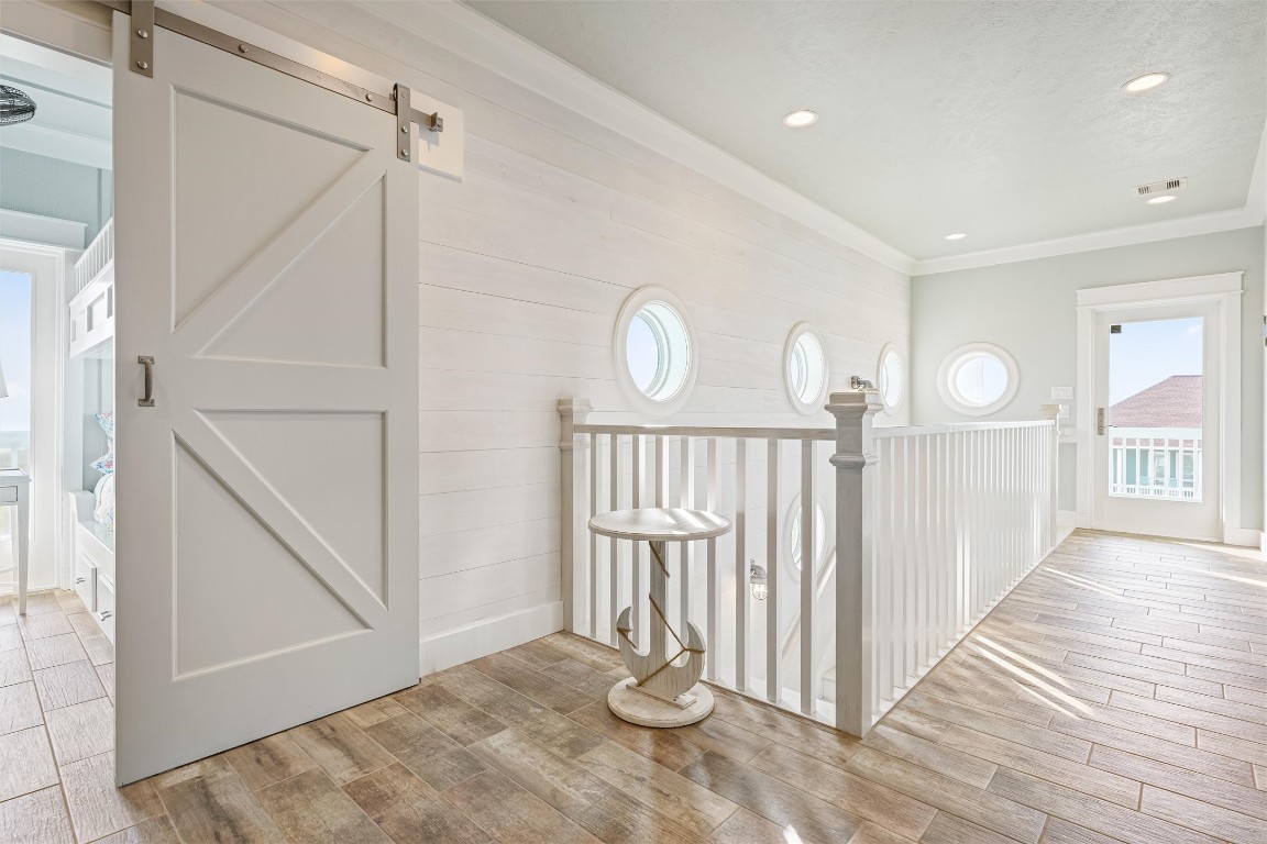 3116 James Street Crystal Beach, TX 77650 - Photo 28 of 47 a view of entryway with wooden floor