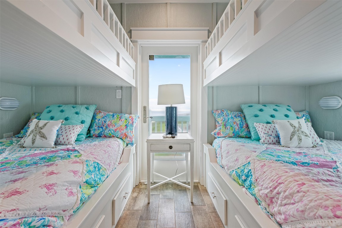 3116 James Street Crystal Beach, TX 77650 - Photo 45 of 47 a bedroom with a bed and a large window