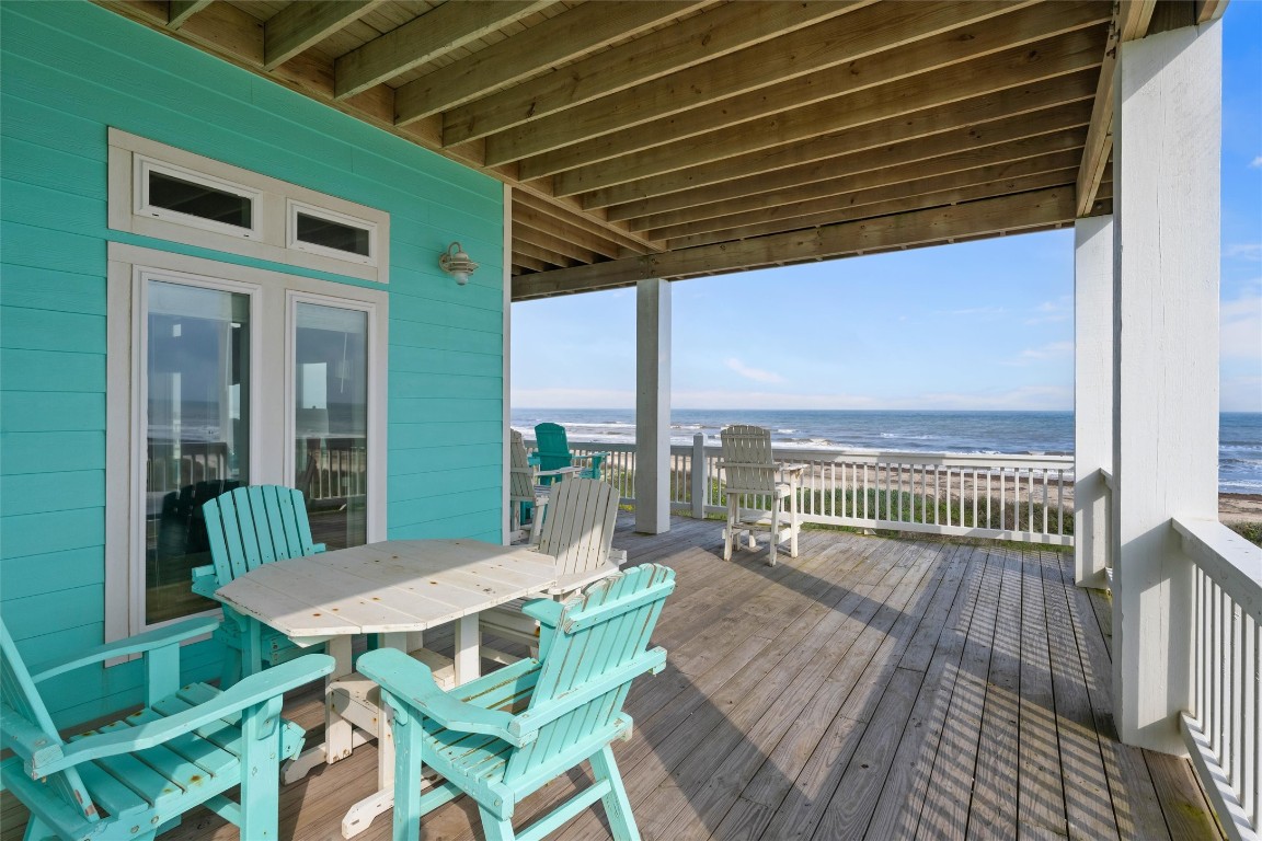 3116 James Street Crystal Beach, TX 77650 - Photo 9 of 47 a view of a chairs and table on the deck