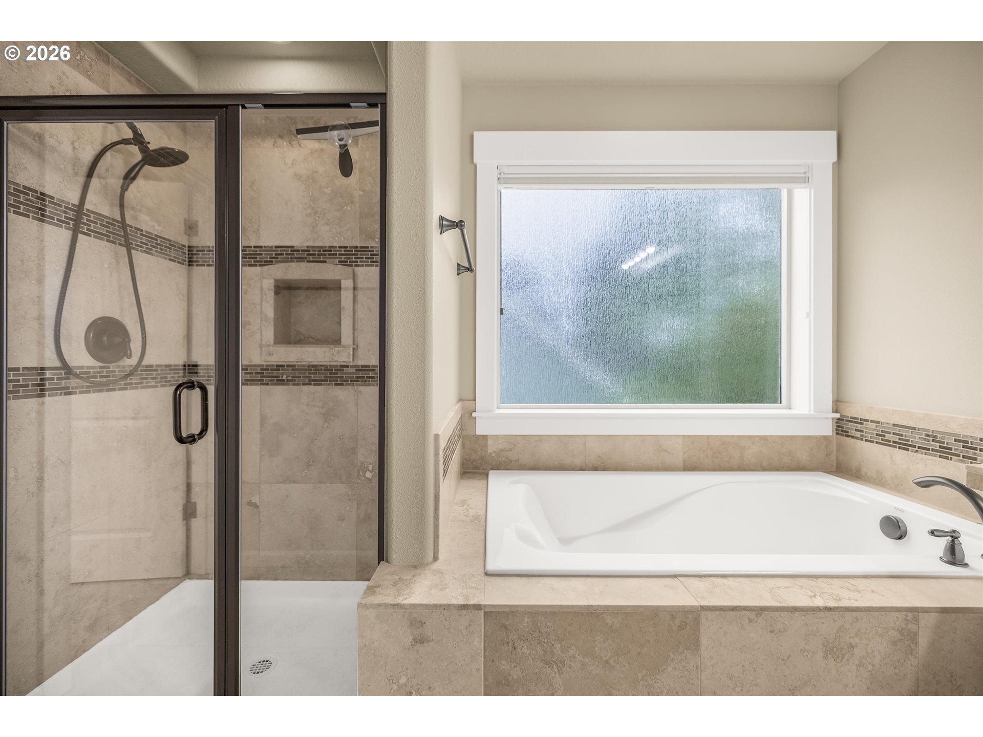 16073 Southeast Pinot Road Milwaukie, OR 97267 - Photo 24 of 44 a bathroom with a glass shower door and a window