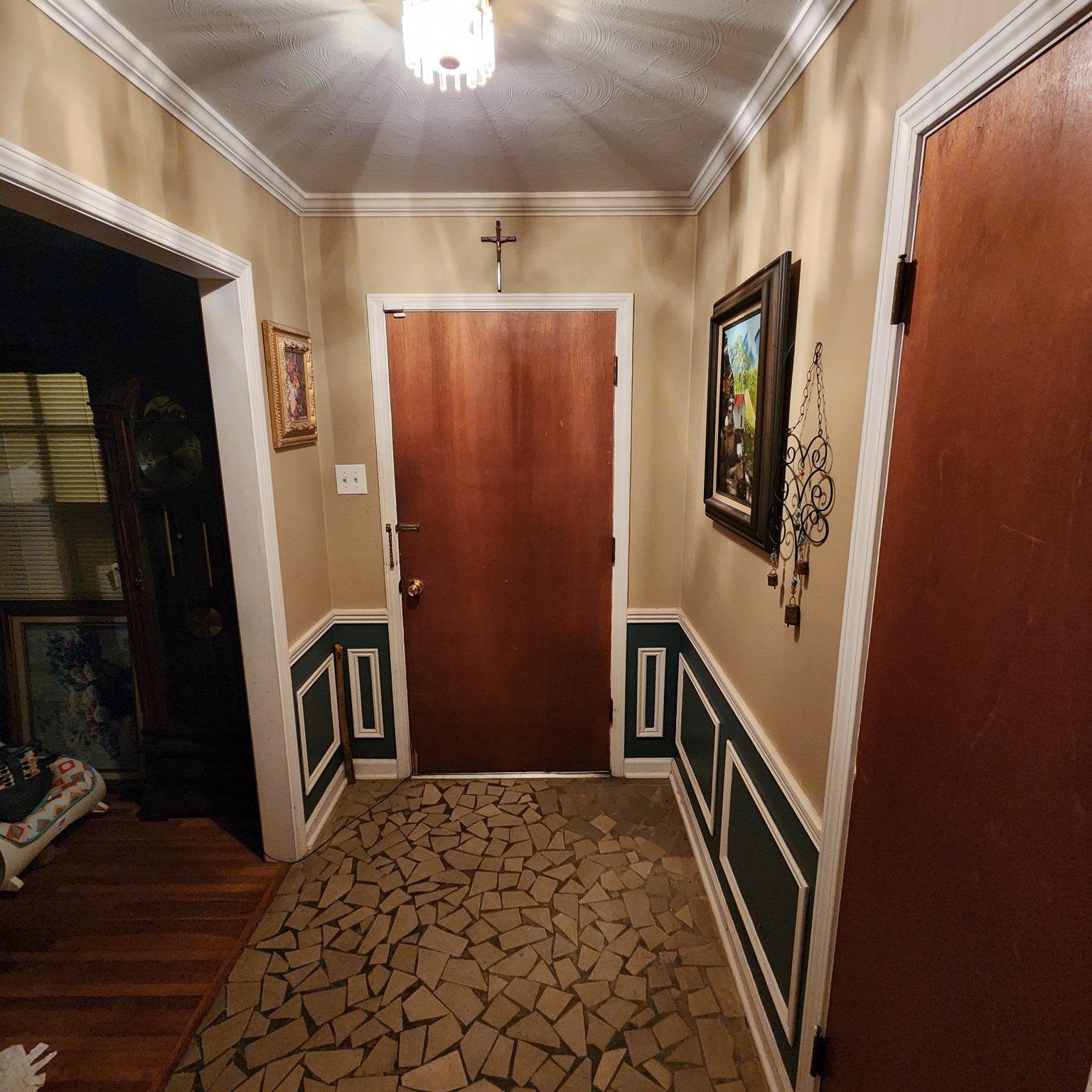 2951 Bannockburn Road Memphis, TN 38128 - Photo 3 of 18 a view of a hallway with wooden floor and staircase