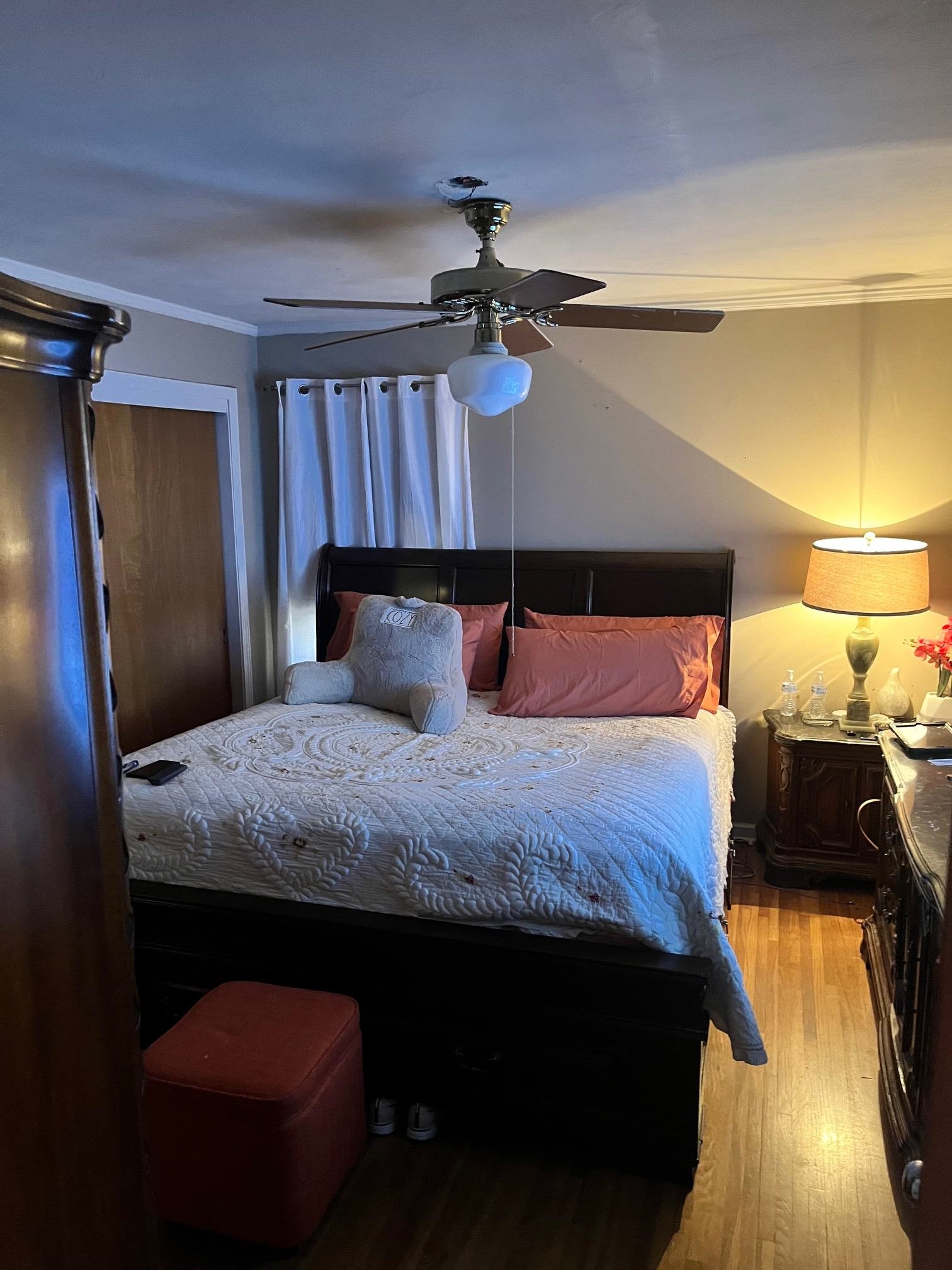 2951 Bannockburn Road Memphis, TN 38128 - Photo 10 of 18 a bedroom with a bed and a walk in closet