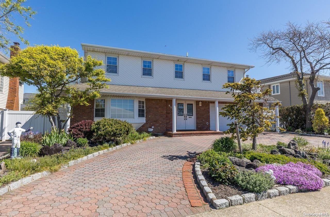 959 Marginal Road Lido Beach, NY 11561 - Photo 1 of 1 a front view of a house with garden