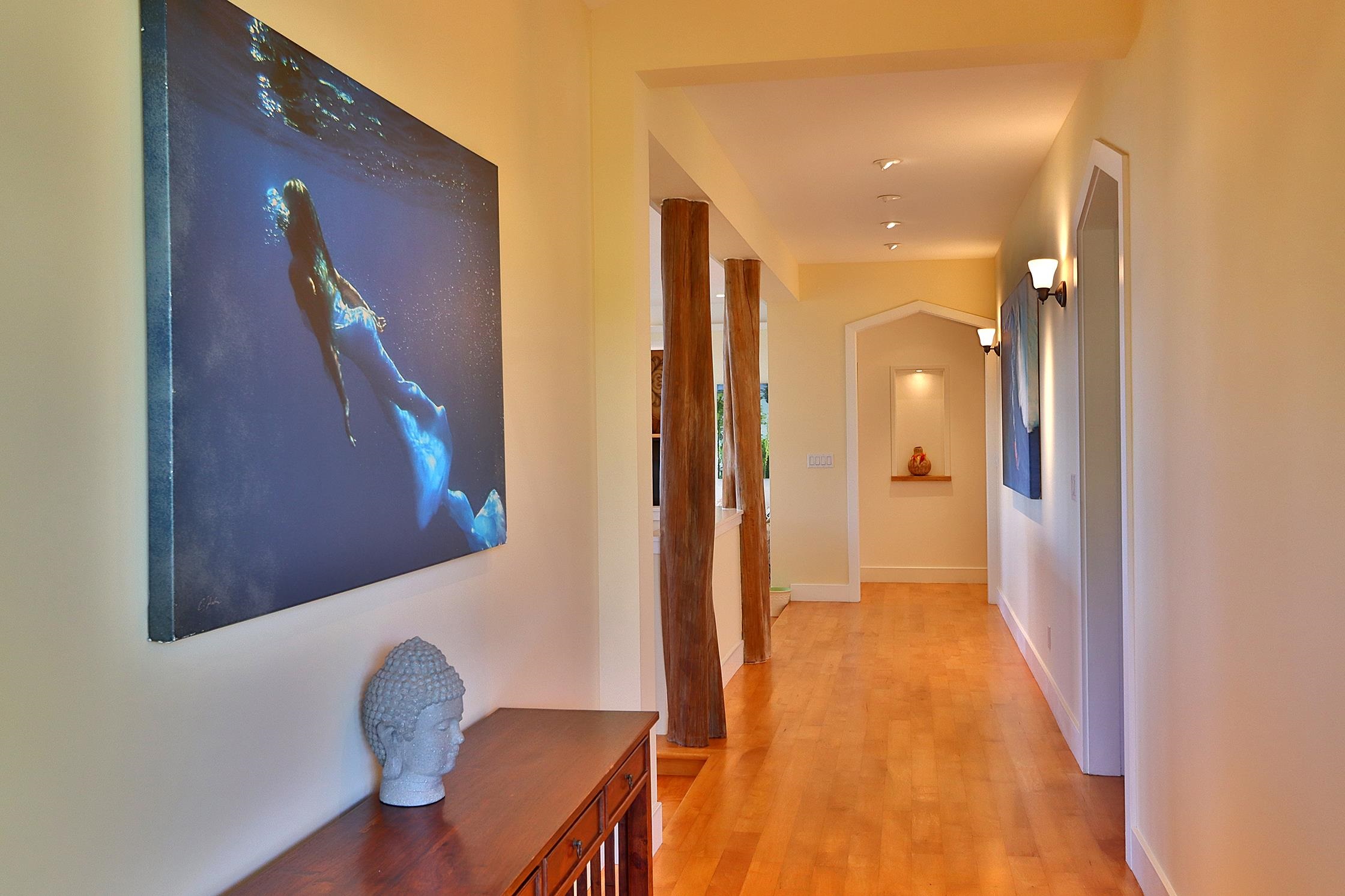 14 Lower Ulumalu Road Haiku, HI 96708 - Photo 12 of 50 a view of a hallway with wooden floor