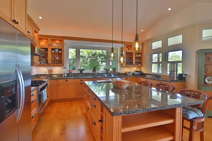 14 Lower Ulumalu Road Haiku, HI 96708 - Photo 16 of 50 a kitchen with a stove a sink and a refrigerator