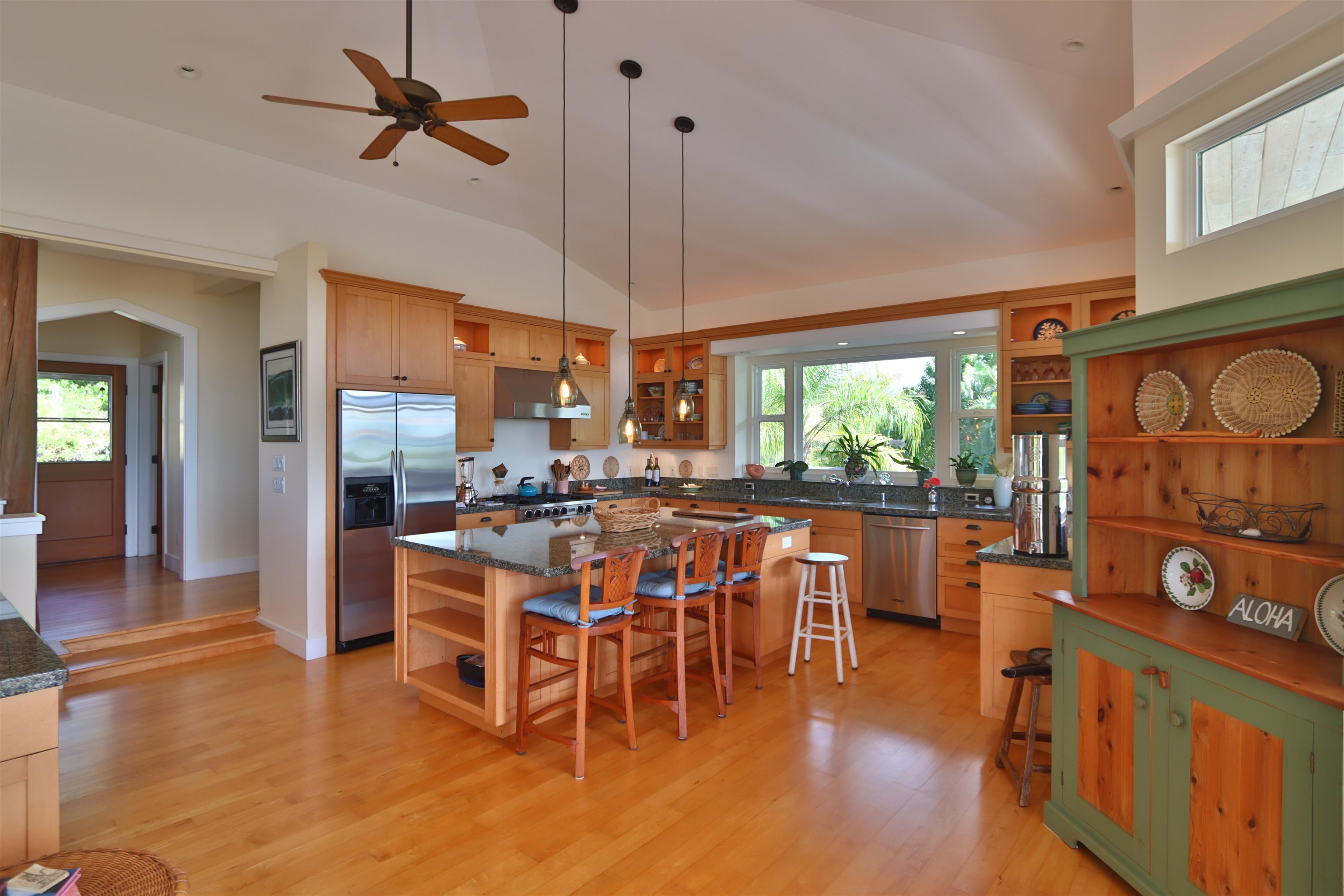 14 Lower Ulumalu Road Haiku, HI 96708 - Photo 17 of 50 a view of a dining room with furniture window and wooden floor