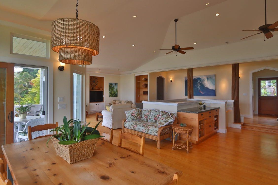 14 Lower Ulumalu Road Haiku, HI 96708 - Photo 19 of 50 a living room with furniture a potted plant and a chandelier