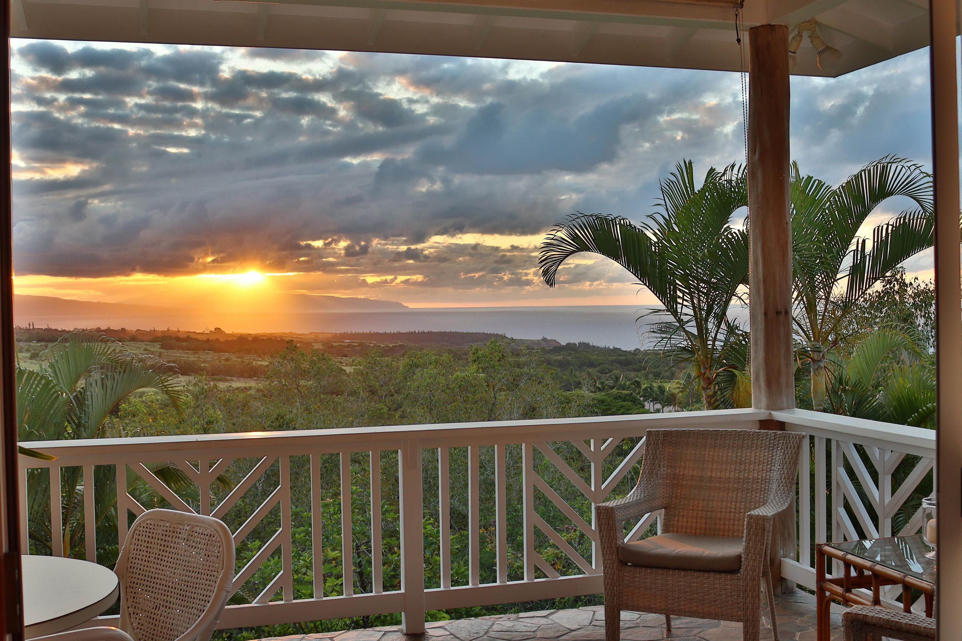 14 Lower Ulumalu Road Haiku, HI 96708 - Photo 21 of 50 a view of a balcony with wooden floor