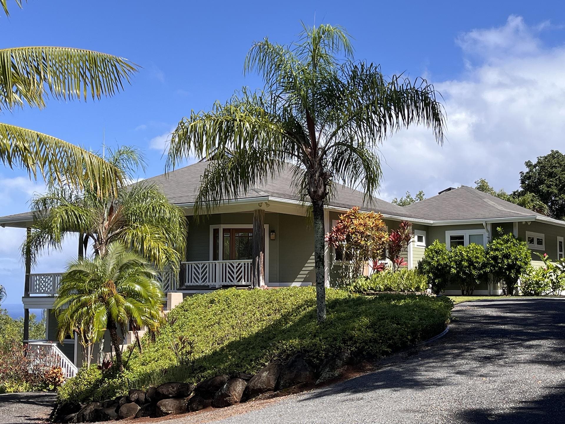 14 Lower Ulumalu Road Haiku, HI 96708 - Photo 3 of 50 a front view of a house with garden