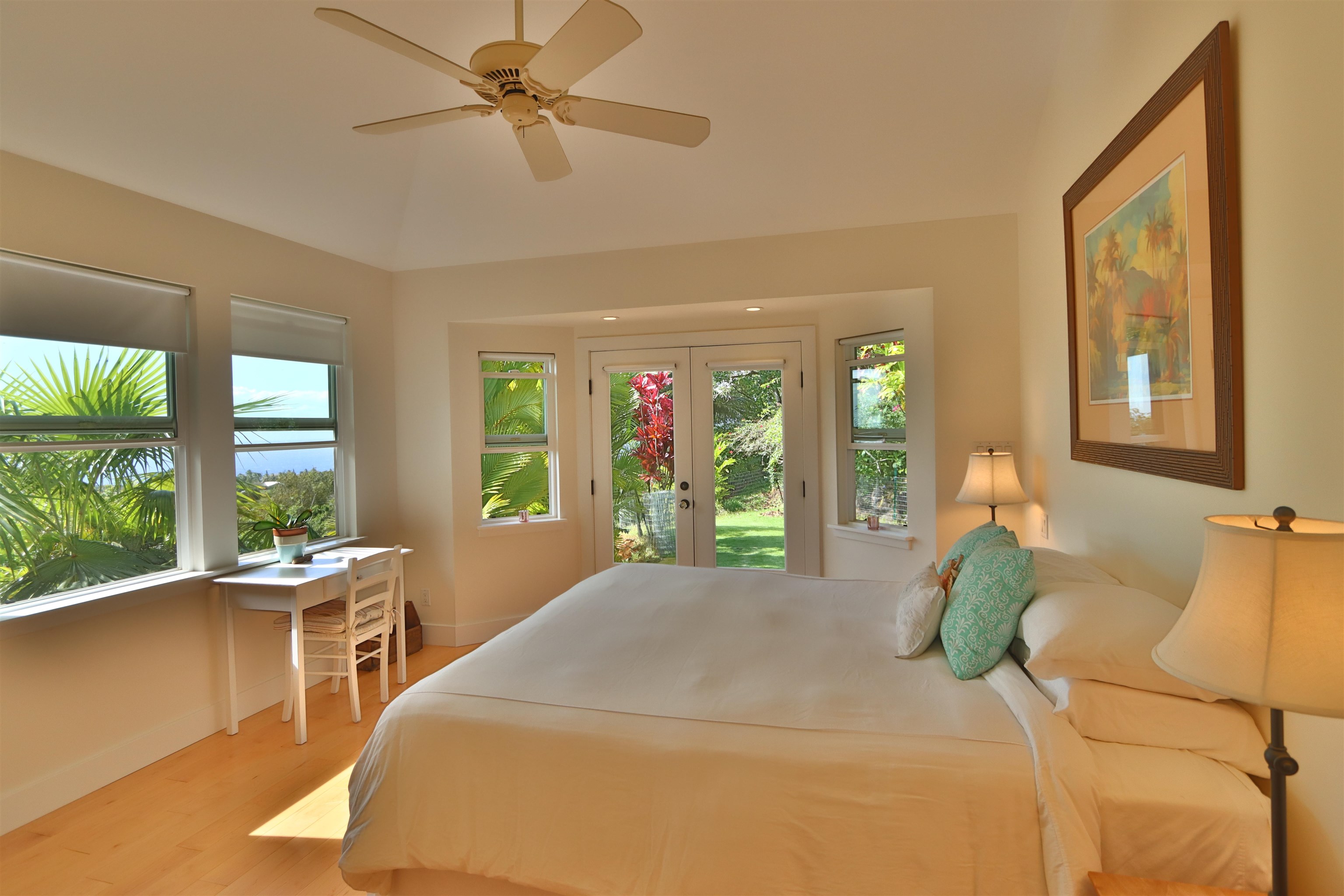 14 Lower Ulumalu Road Haiku, HI 96708 - Photo 33 of 50 a living room with a bed furniture and a large window