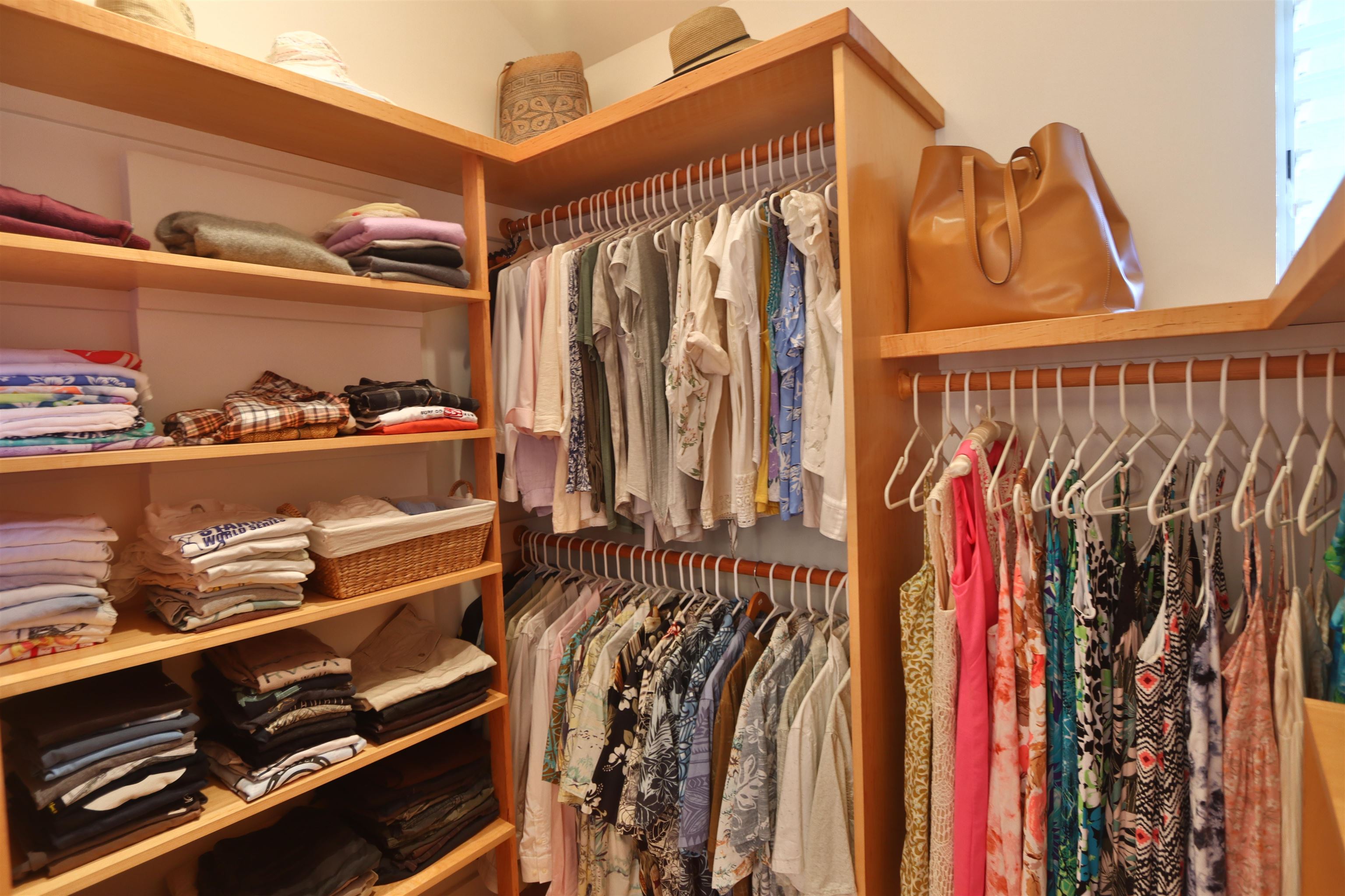 14 Lower Ulumalu Road Haiku, HI 96708 - Photo 38 of 50 a view of walk in closet with clothes and shoes