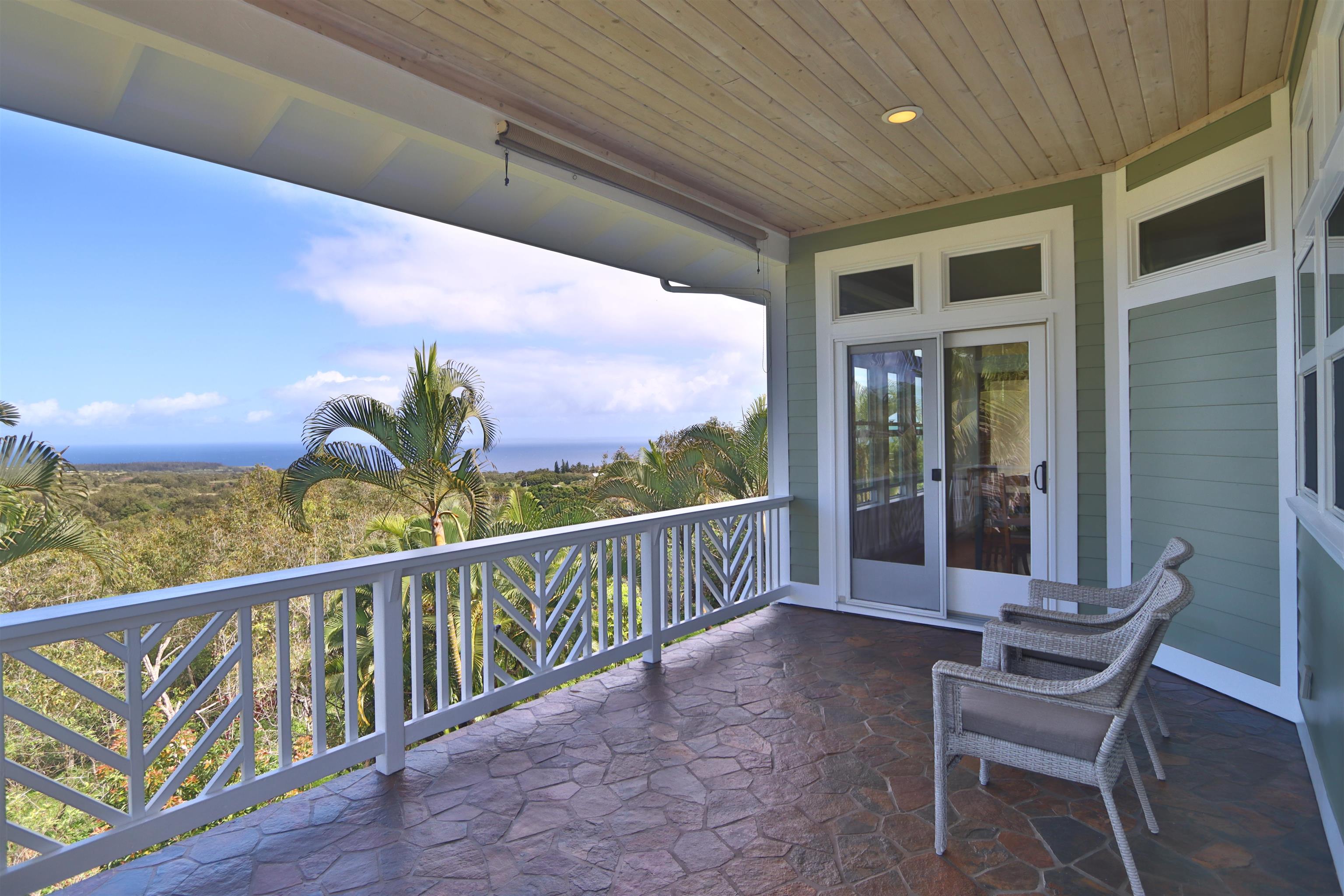14 Lower Ulumalu Road Haiku, HI 96708 - Photo 6 of 50 a view of a chairs and table in the balcony