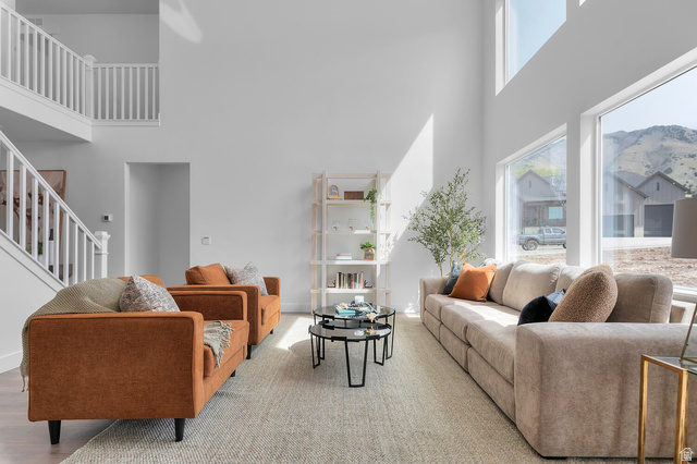 342 North Rhyolite Drive, Unit 88 Hurricane, UT 84737 - Photo 6 of 26 Two-story living area featuring tall ceilings and abundant natural light