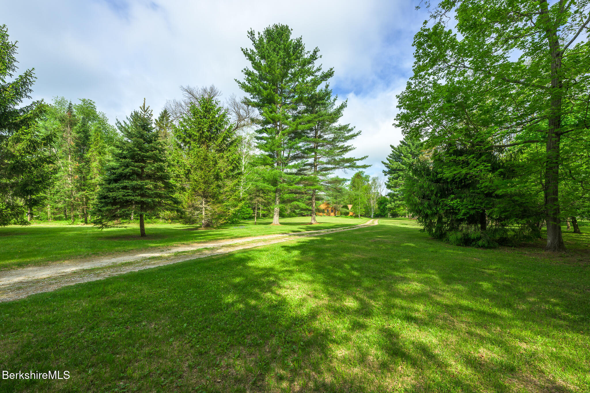 33 Interlaken Road Stockbridge, MA 01266 - Photo 5 of 36 a view of a park with trees in the background