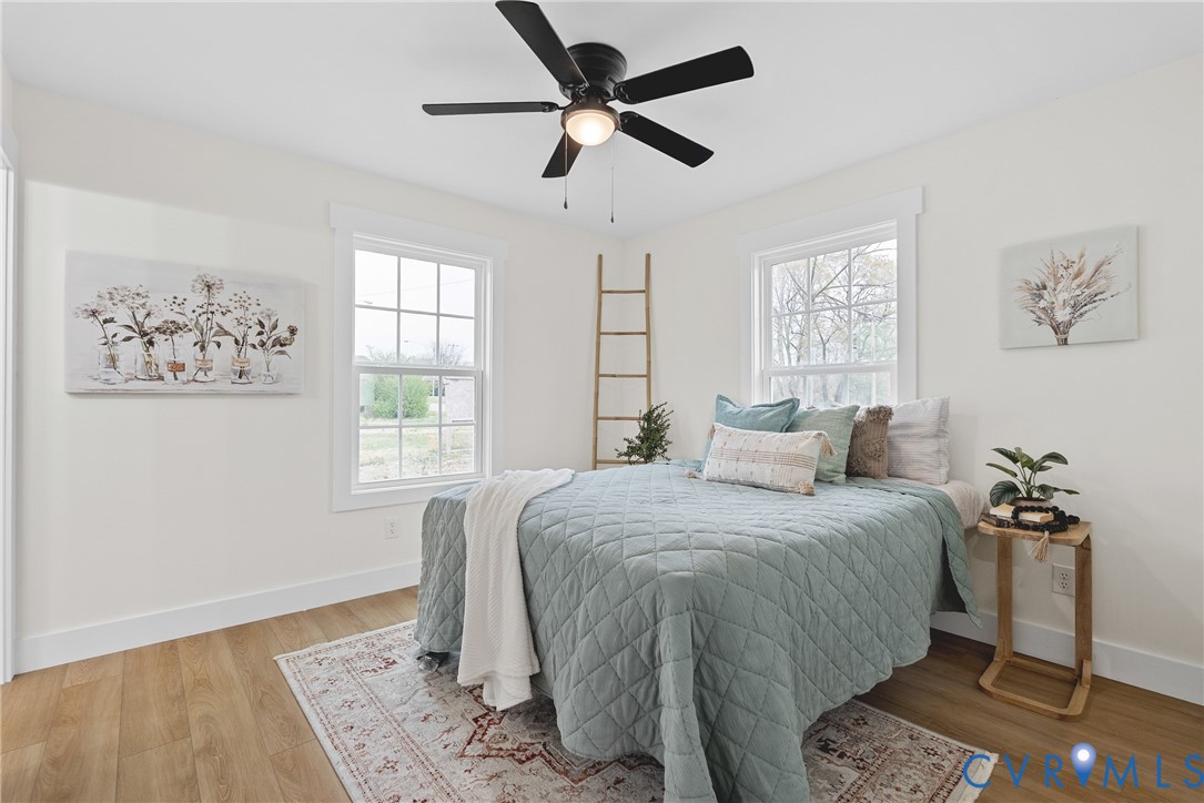 601 Mill Pond Drive Ruther Glen, VA 22546 - Photo 17 of 32 a bedroom with a bed and a window