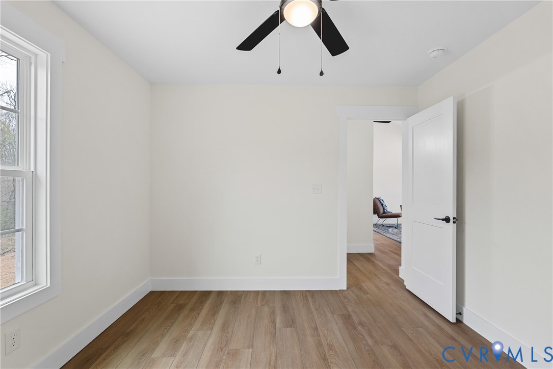 601 Mill Pond Drive Ruther Glen, VA 22546 - Photo 26 of 32 a view of a room with wooden floor sink and closet