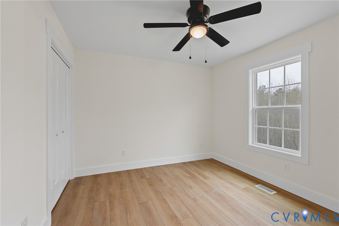 601 Mill Pond Drive Ruther Glen, VA 22546 - Photo 27 of 32 an empty room with a window
