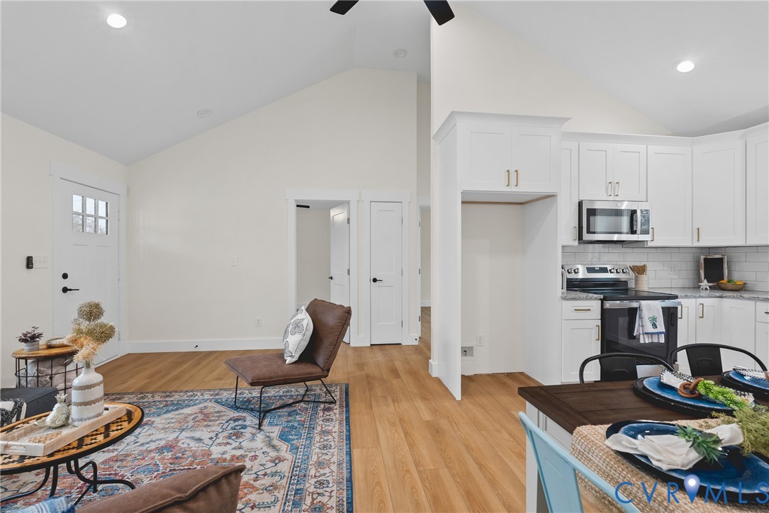 601 Mill Pond Drive Ruther Glen, VA 22546 - Photo 6 of 32 a bedroom with a bed and furniture