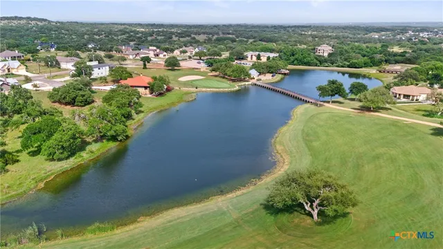 a view of a lake with a city view