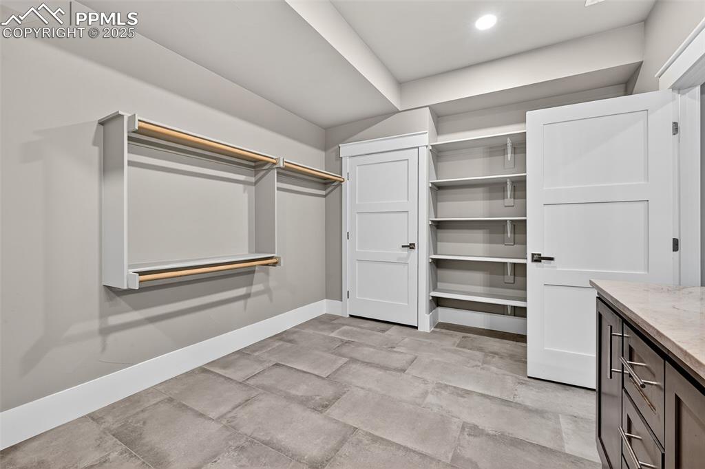 485 Cardiff Circle Colorado Springs, CO 80906 - Photo 43 of 50 a view of an empty walk in closet