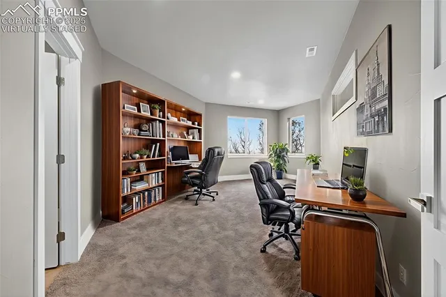 a living room with furniture and view of living room