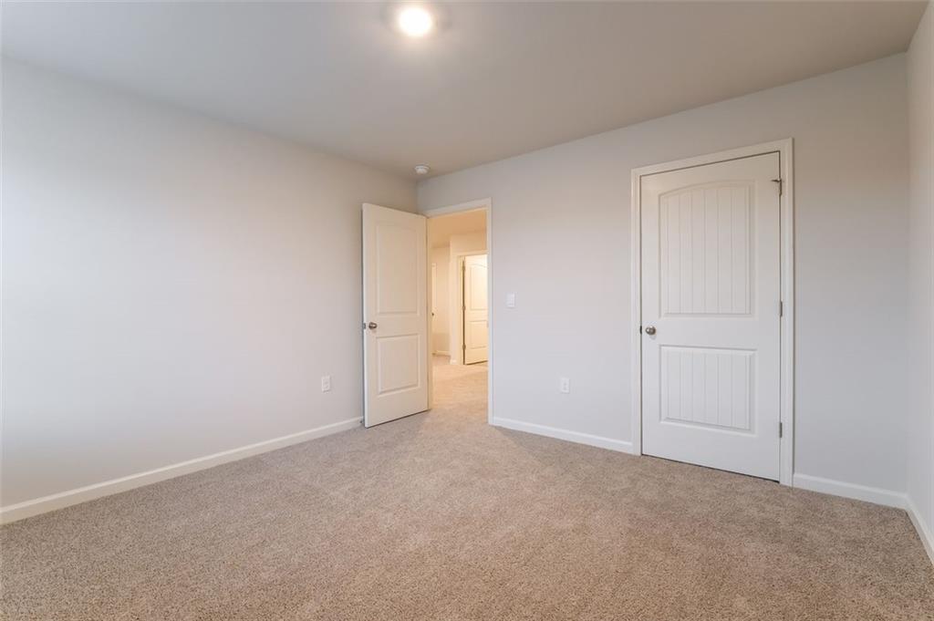 14 Canterbury Valley Braselton, GA 30517 - Photo 17 of 25 a view of an empty room and closet area
