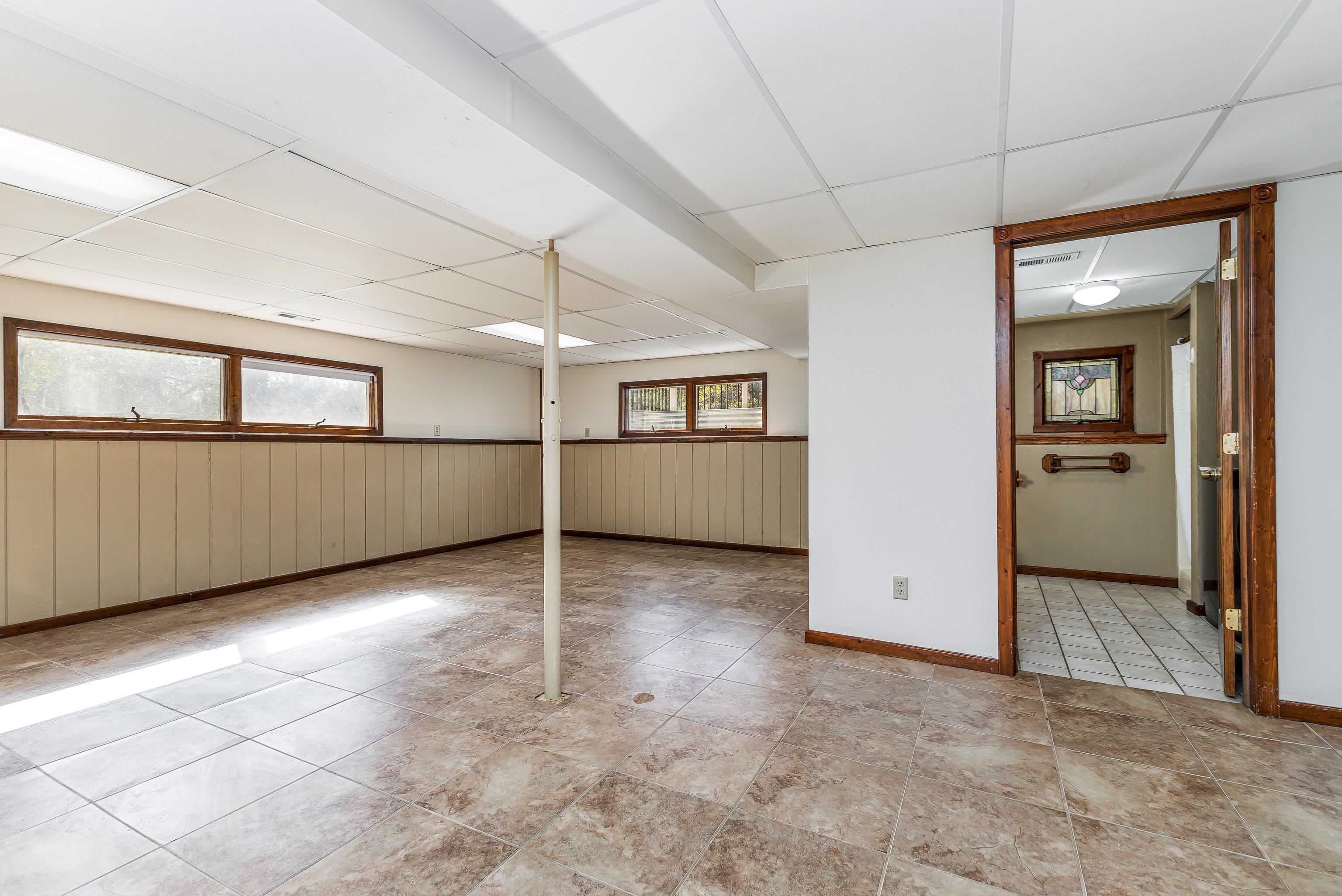 151 North Blackjack Road Galena, IL 61036 - Photo 30 of 65 an empty room with a empty space and windows