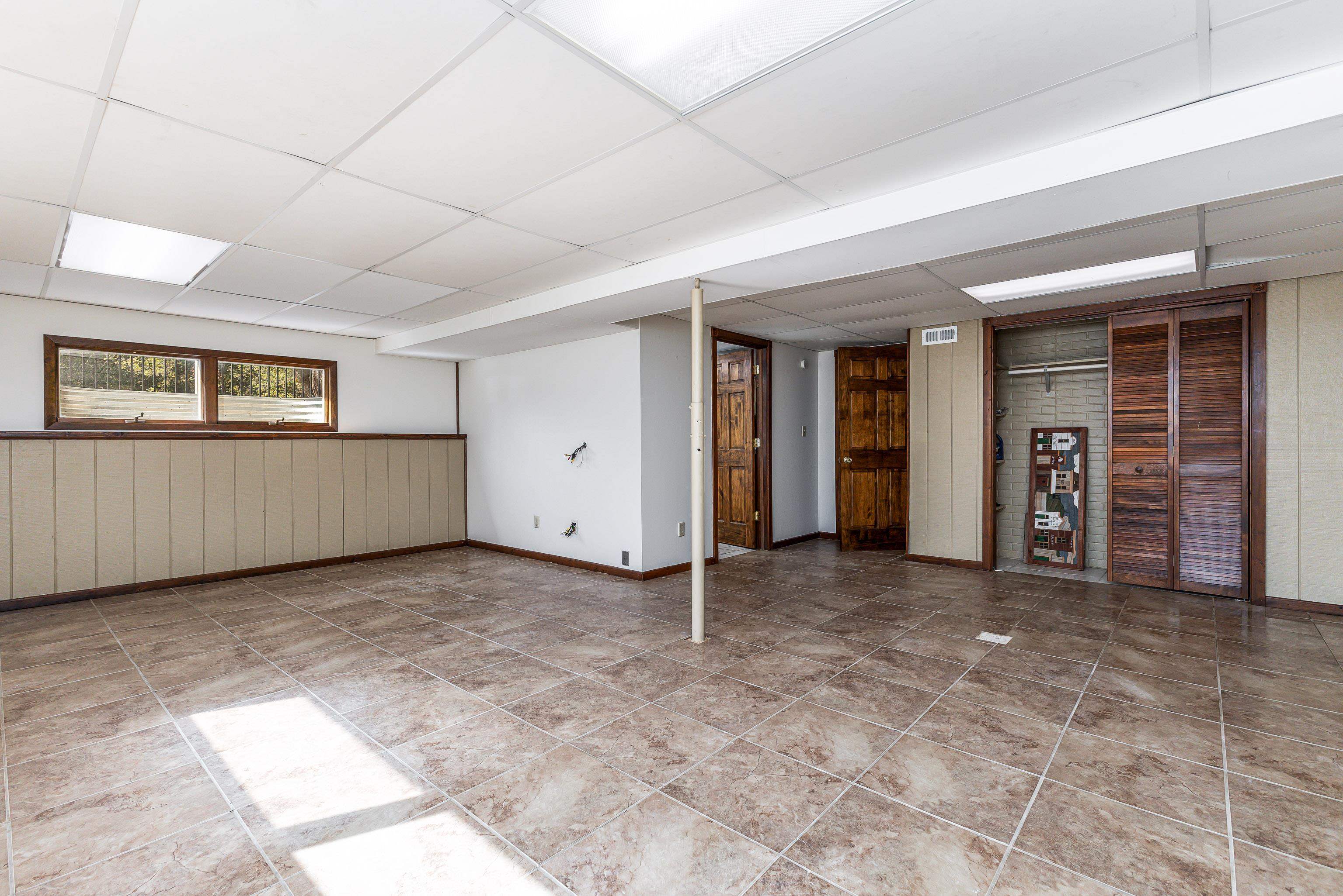 151 North Blackjack Road Galena, IL 61036 - Photo 32 of 65 a view of an empty room with closet and stairs