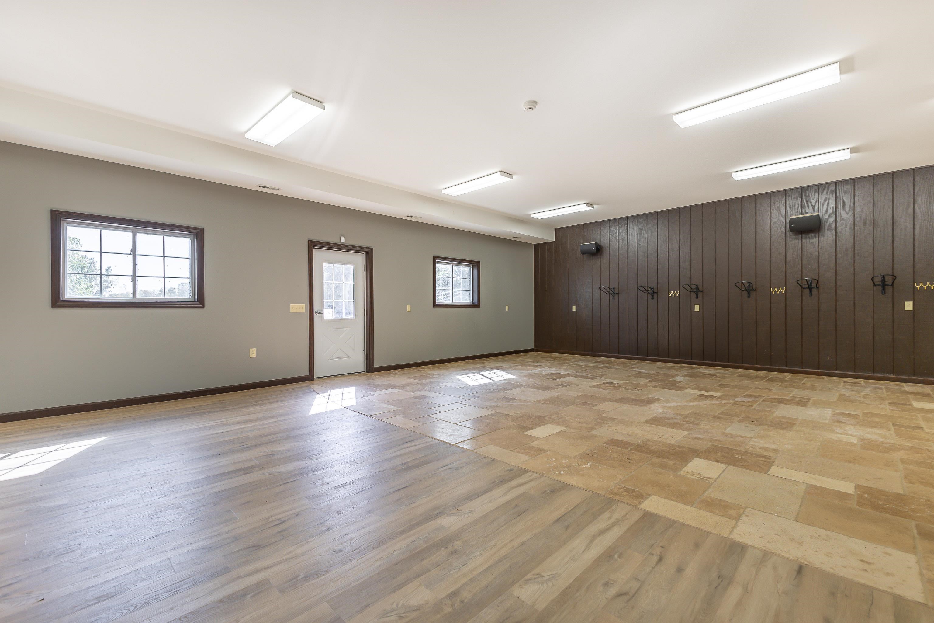151 North Blackjack Road Galena, IL 61036 - Photo 45 of 65 a view of an empty room with wooden floor and a window
