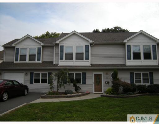 10 Sturgis Road Edison, NJ 08817 - Photo 1 of 9 a front view of a house with a yard