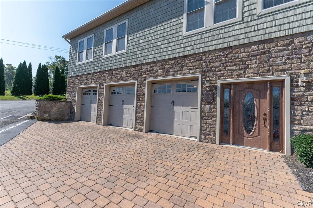 683 Easton Road, Unit AC Riegelsville, PA 18077 - Photo 3 of 27 a house view with a outdoor space