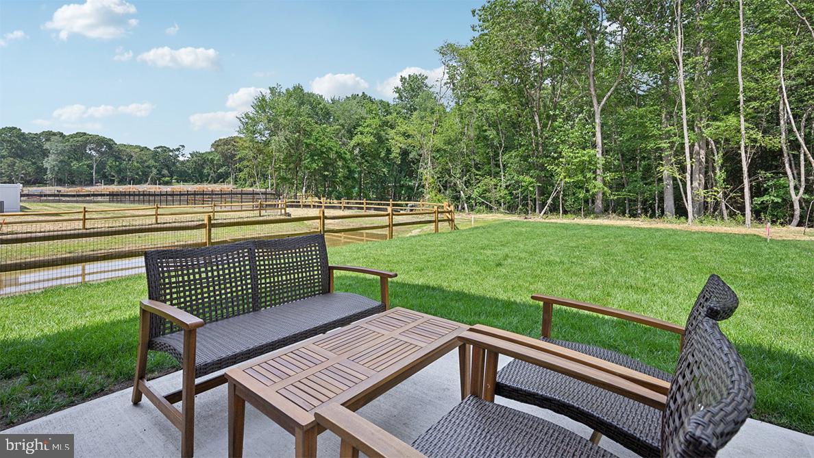 26 Reagan Drive Runnemede, NJ 08078 - Photo 36 of 48 a view of a wooden deck with a yard