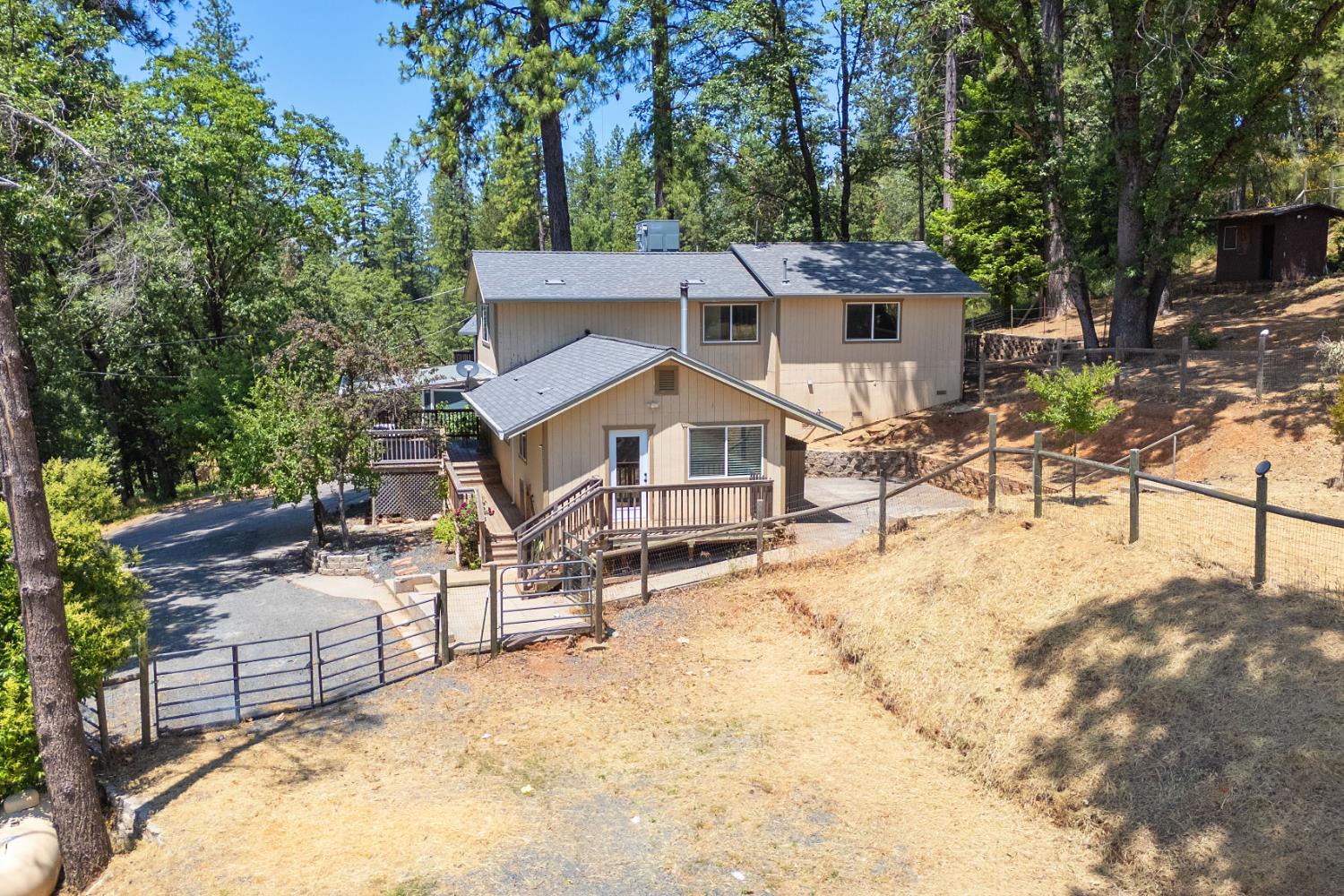 895 Sunray Lane Colfax, CA 95713 - Photo 1 of 1 a view of a house with backyard and sitting area