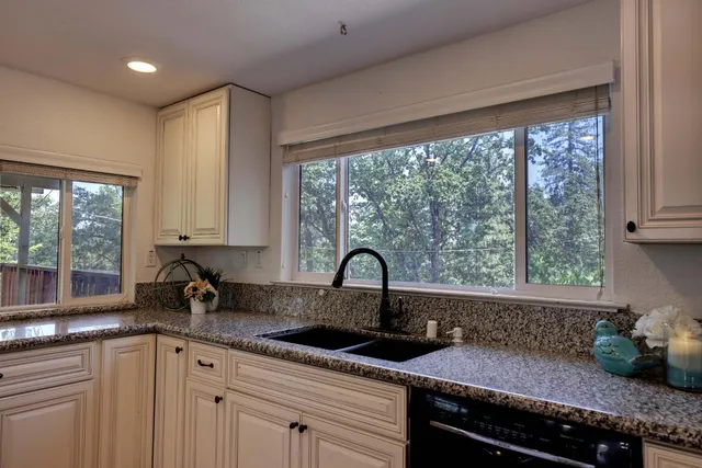a view of a livingroom with furniture and window