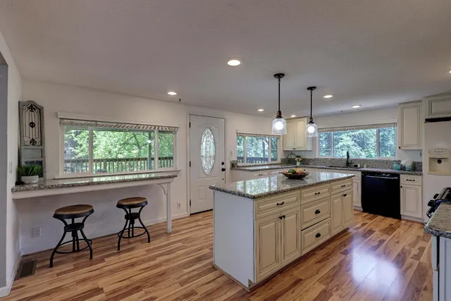 a view of backyard with wooden floor and outdoor space