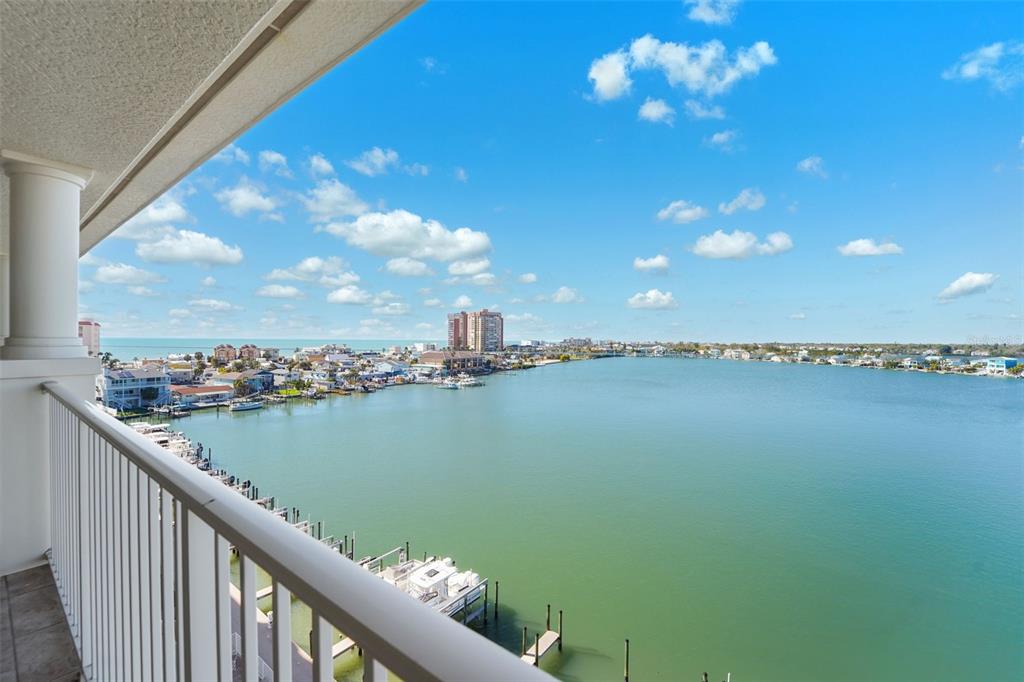 17735 Gulf Boulevard, Unit 702 Redington Shores, FL 33708 - Photo 1 of 60 a view of a lake from a balcony