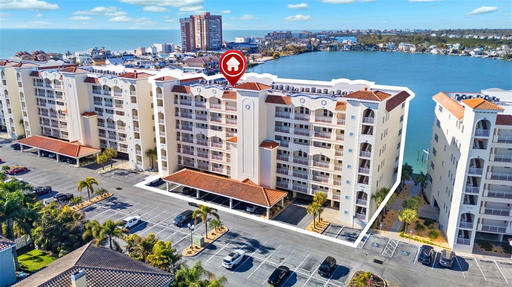 17735 Gulf Boulevard, Unit 702 Redington Shores, FL 33708 - Photo 2 of 60 a view of a city with tall buildings