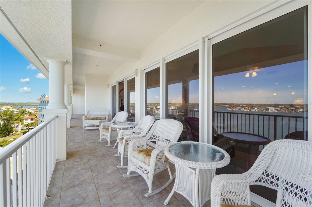 17735 Gulf Boulevard, Unit 702 Redington Shores, FL 33708 - Photo 35 of 60 a living room with furniture and a large window