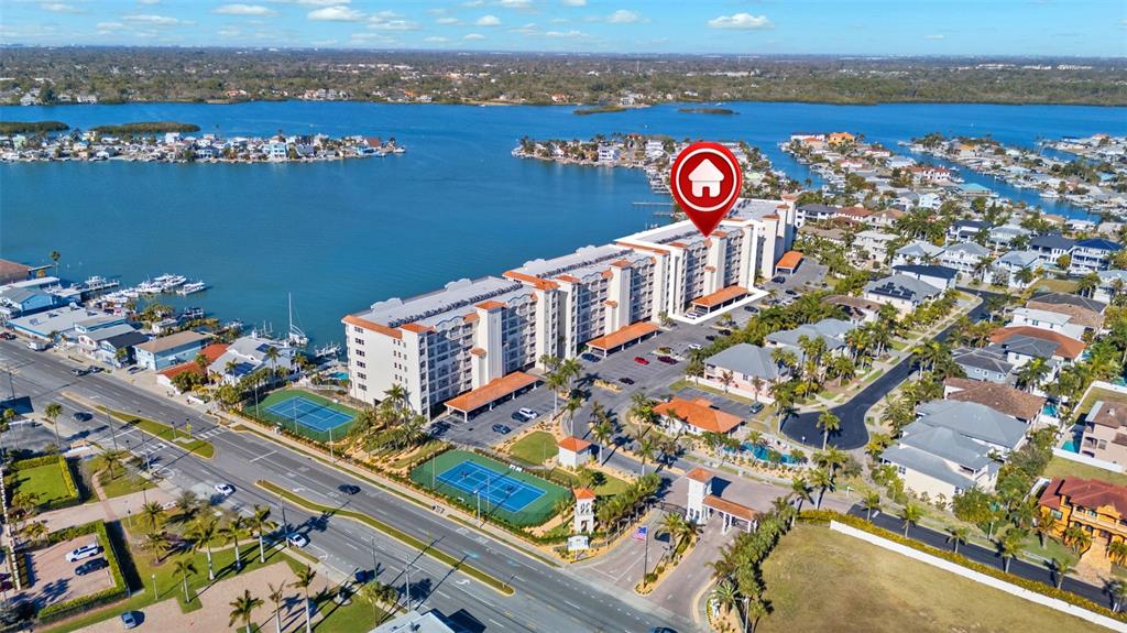 17735 Gulf Boulevard, Unit 702 Redington Shores, FL 33708 - Photo 55 of 60 an aerial view of a houses with outdoor space