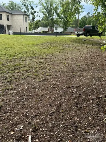 a view of a lake with outdoor space