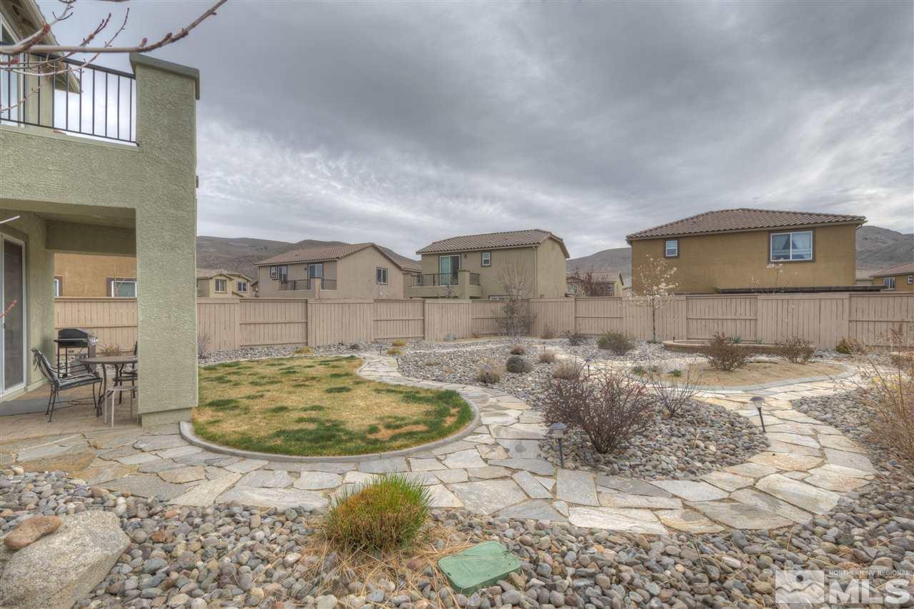 2810 Show Jumper Lane Reno, NV 89521 - Photo 7 of 38 a view of a house with backyard