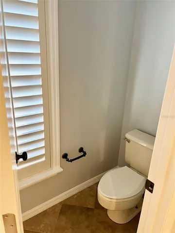 a bathroom with a toilet and a sink